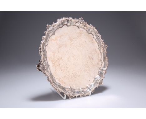 ^ A VICTORIAN SILVER SALVER, maker's mark rubbed, inscribed 'Hunt &amp; Roskell, Late Storr &amp; Mortimer, 6656', London 187