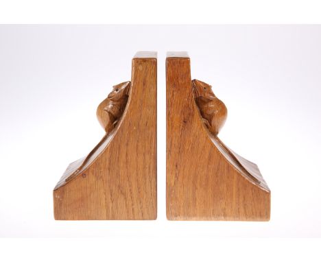ROBERT THOMPSON OF KILBURNA PAIR OF MOUSEMAN OAK BOOKENDS, of characteristic form, adzed, carved mouse signature. 15.5cm high