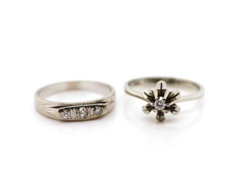 Two diamond set 18ct white gold rings marked 18ct and 750. Approx weight 6.3 grams, ring size M. (140466)