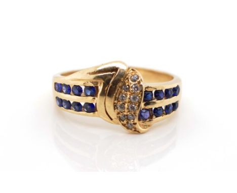 9ct yellow gold and simulant sapphire ring also set with white gemstones. Unmarked. Approx weight 4.5 grams, ring size R. (14