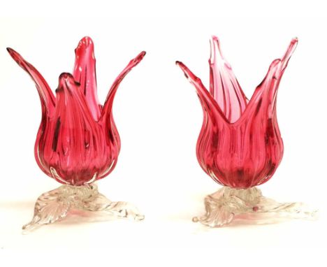 Pair Victorian tulip form ruby glass vases each in form of open blossom, on clear glass base, (height 13cm approx, each).