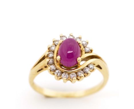 Ruby and diamond set 14ct yellow gold ring marked 14k. Approx weight 5.4 grams, ring size J (140747)