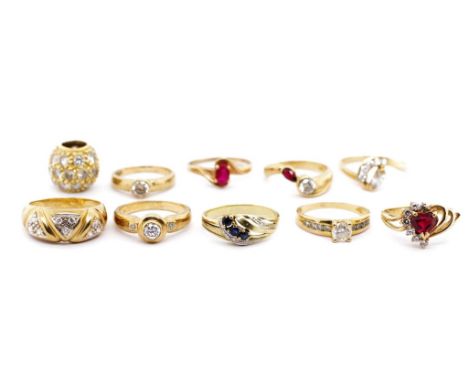 Nine gemstone set 9ct yellow gold rings and a pendant charm, rings to include, sapphire, simulant ruby, and cz  examples appr