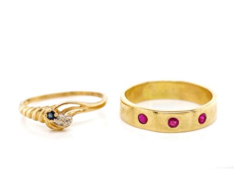 Two Gemstone set 9ct yellow gold rings includes a ruby and sapphire example. Approx weight 6.4 grams, ring size T&amp;Q