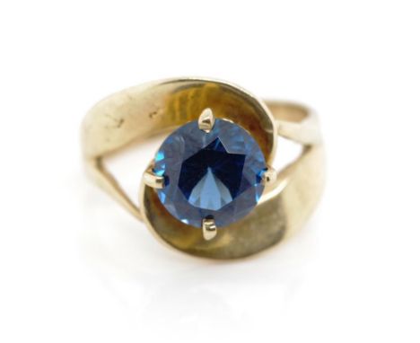 London blue topaz and 9ct yellow gold ring marked 9ct. Approx weight 3.96 grams, ring size L-M
