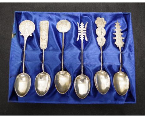 Set of six Chinese silver teaspoons with assorted Chinese motif handles, (weight 52grams approx, total), in original box.