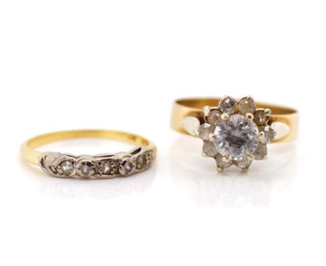 Two 9ct yellow gold and white gemstone rings one marked 9ct and the other Palladium and 9ct. Approx weight 5 grams, rings siz