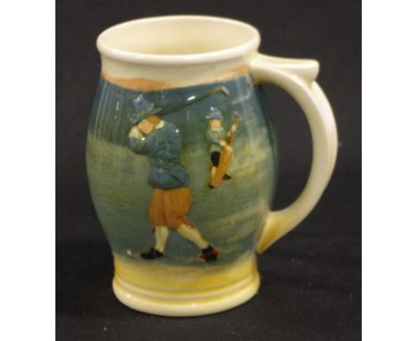 Rare Royal Doulton Queensware golfing tankard C1920's,decorated in low relief golfer &amp; his caddy, after designs by Charle