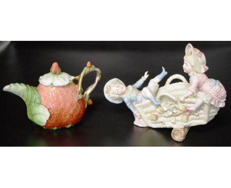 Two vintage Continental ceramic ornamental pieces including bisque Figures on a Seesaw, basket form vase, marked to base and 