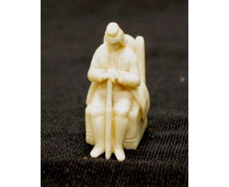 Antique ivory miniature seated gentleman figure height 3.5cm approx,  NB This item may not be exported