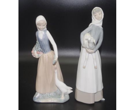 Lladro Woman with Lamb ceramic  figure marked to base, (height 28cm approx); together with a Nao Woman with Goose ceramic fig