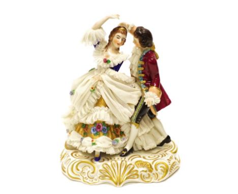 Good Dresden Dancing Couple ceramic figure Dancing Man and Woman, hand painted decoration, lace details, on gilt decorated ba