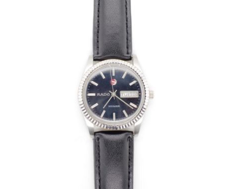 Rado automatic "Voyager" watch with day date windows, fluted bezel and steel case, Eta automatic movement, plexi glass and on