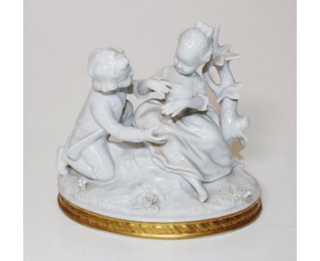 Dresden Unter Weiss Bach ceramic figural group Courting Couple, white ceramic figure, on gilt foot, marked to base, (height 1