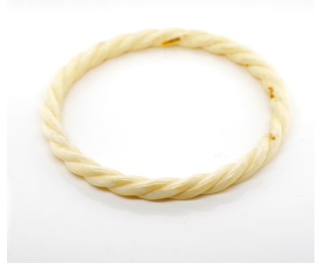 Mid century ivory twist bangle circa 1950s, internal diameter approx 6+cm. NB This item may cannot be exported