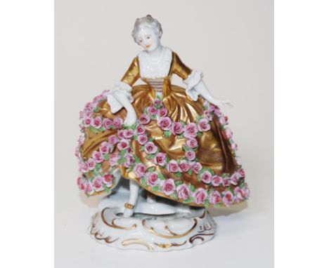 Vintage German Dancing Woman ceramic figure Dancing Woman with gilded gown, applied floral decoration, beehive mark to base, 