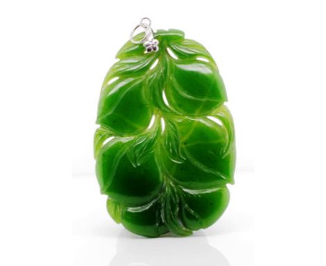 Vintage Chinese carved jade pendant , in a well carved fruit and leaf form dark green panel. Approx width 42mm, length 61mm. 