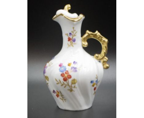 Continental ceramic hand painted scent bottle good hand painted floral decoration, with gilt highlights to lid and handle, (h