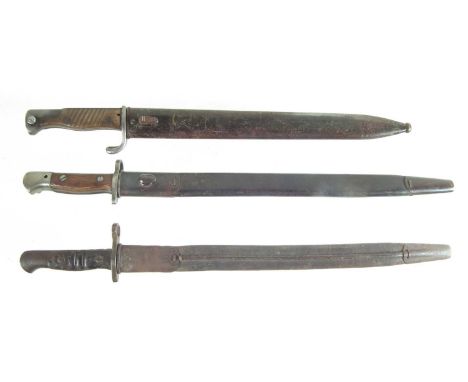 Three WWI bayonets and scabbards, to include a 1907 Wilkinson SMLE bayonet, a 1913 P14 bayonet and a German 98 bayonet.The la