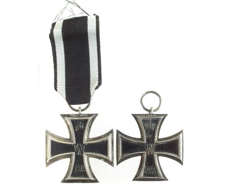 Two German WWI Iron crosses, one with maker's mark to suspension ring.