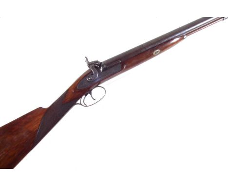 T. & W. Harrison 12 bore percussion double barrel shotgun, with 29 inch Damascus barrels, chequered stock with vacant escutch