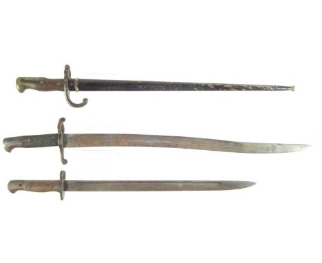 Three bayonets, to include a 1907 SMLE bayonet, a German yataghan bayonet and a Gras 1870 bayonet and scabbard.The largest me