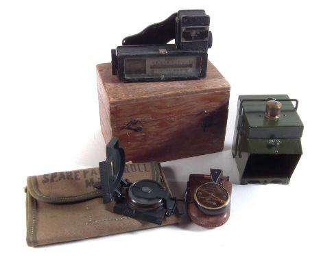 Marine distance meter, Weldon range finder, a compass, Spare Parts Case (empty) and a Lantern Electric No.2 with broad arrow 