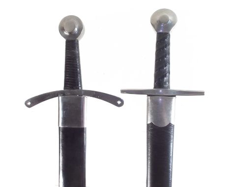 Two modern replica swords and scabbards, to include a copy of a Thorpe Falchion and scabbard, after a 13th century original, 