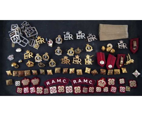 A collection of Royal Artillery Medical Core cap badges and epaulettes pips ER2 accompanied by Medical Core coasters and plac