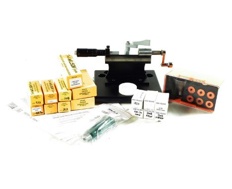 LE Wilson case trimmer with micrometer adjustment dial, together with eleven gauges and case holders, for 308, .223, 45-70, a