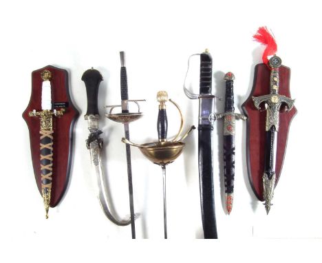 Collection of swords and daggers, to include two 20th century rapiers one marked Paul, an Indian 1822 style sword an Indian c