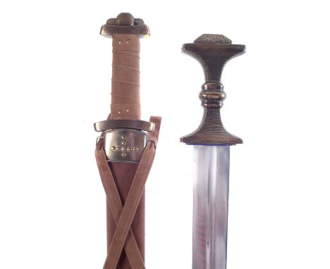 Two modern replicas of Viking swords, to include a copy of a Danish long sword circa 400 AD and a 'Godfred' broadsword and sc