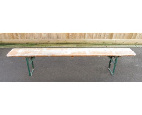 A folding single plank German beer bench with green painted metal supports, 220.5cm long