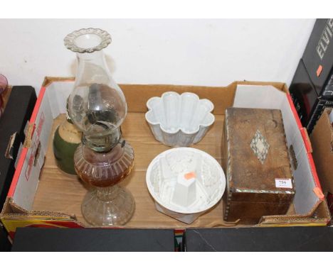 A Victorian walnut and mother of pearl inlaid twin compartment tea caddy; together with two Victorian jelly moulds; a glass o