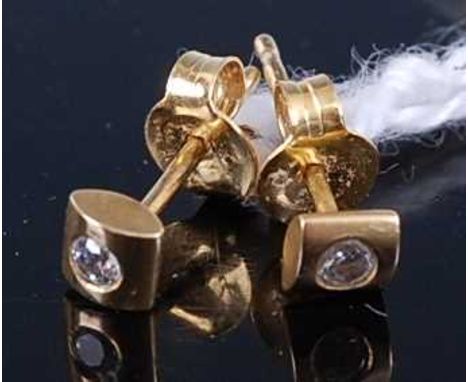 A pair of modern 14ct gold and diamond point set ear studs, 0.8g