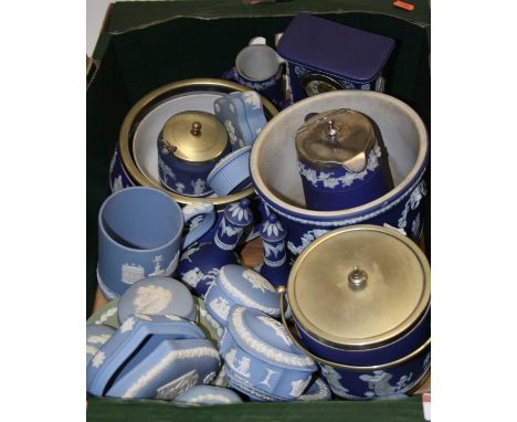 A box containing a collection of Wedgwood blue jasper ware to include a mantel clock, jardiniere, biscuit barrel etcCondition