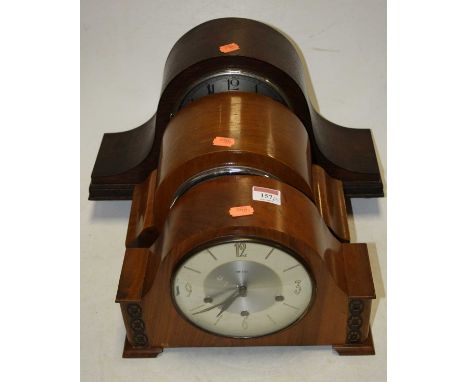 A 1920s oak cased Napoleon hat eight-day mantel clock, the silvered dial showing Arabic numerals, h.23cm; together with two s