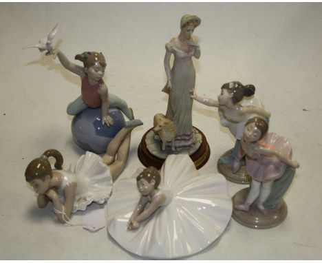 A collection of four Nao Spanish porcelain figures of ballerinas/dancers, each having printed mark verso, height of largest 2