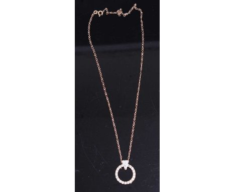 A cz set ring pendant, in 9ct gold mount and on 9ct gold neck chain, gross weight 5.4g