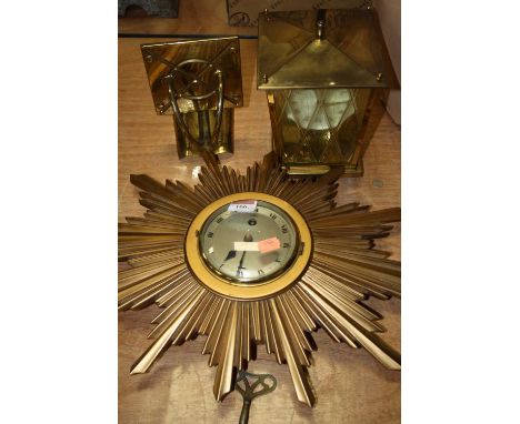A 20th century gilt painted sunburst wall clock, the silvered chapter showing Roman numerals, w.51cm; together with a 20th ce