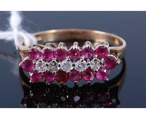 A 9ct gold ruby and diamond point set dress ring, 2.2g, size O/P