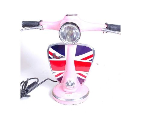 A modern pink painted desk lamp in the form of a Vespa moped, h.33cm
