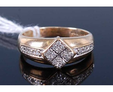 A contemporary 9ct gold and CZ set dress ring, 3.2g, size M