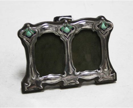 A modern silver clad and enamelled double photo frame in the Art Nouveau style, 8x11cmCondition report: Some chips to the ena