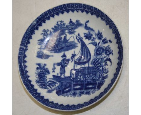 An 18th century Worcester porcelain bowl underglaze blue decorated with a Chinese figure on a junk within landscape having a 