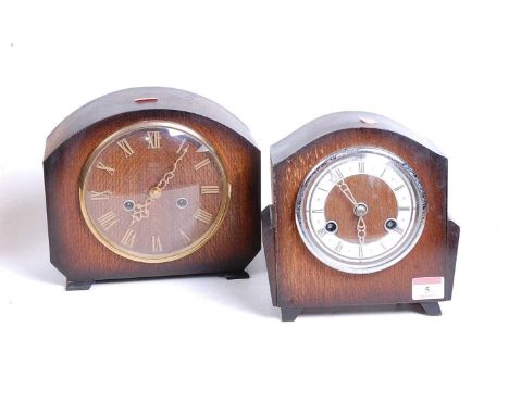 A 1930s oak cased eight-day mantel clock, the chapter ring showing Roman numerals, h.19cm; together with one other similar (2