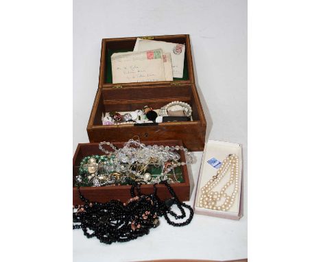 A poker-work box and contents, to include various beaded necklaces, faux pearl necklace, RAF buttons, clay pipe bowls etc 
