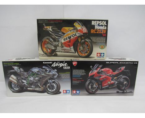 Three Tamiya Motorcycle Series 1:12 scale motorcycle plastic model kits to include 14140 Ducati Superleggera V4, 14130 Repsol