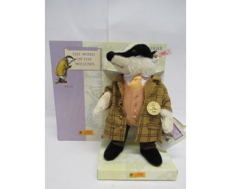 A boxed Steiff limited edition 037030 The Wind In The Willows mohair Badger with gold coloured button, white tag and swing ta