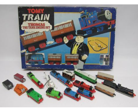 A boxed Tomy Thomas The Tank Engine train set (box worn) and a quantity of loose playworn ERTL Thomas The Tank Engine locomot